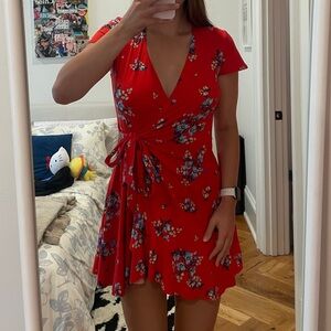 Red floral low cut wrap dress
